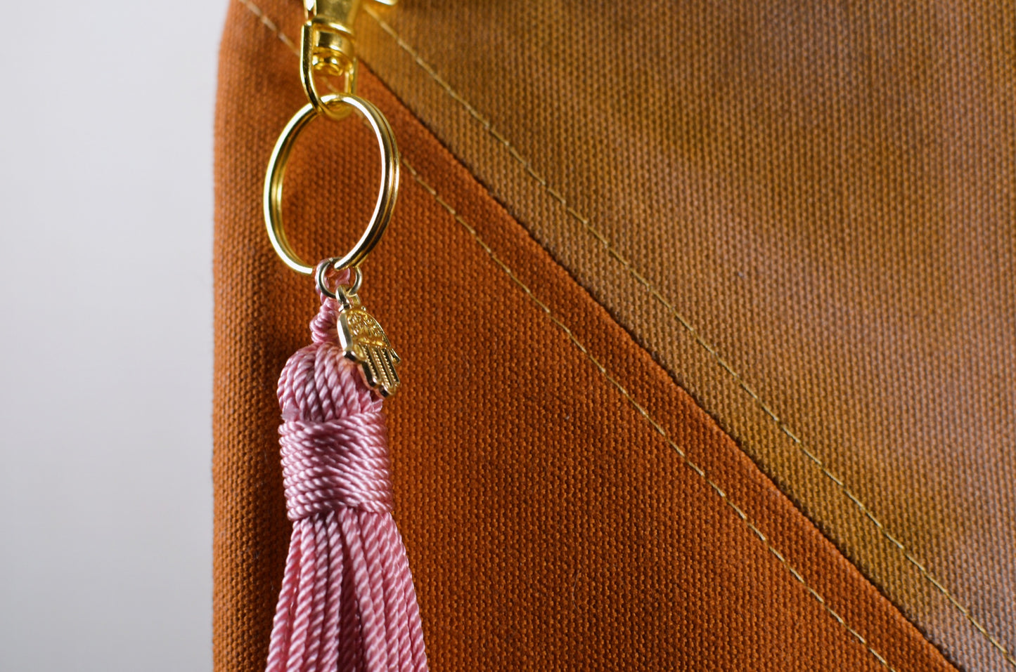 tassel keychain with gold charm