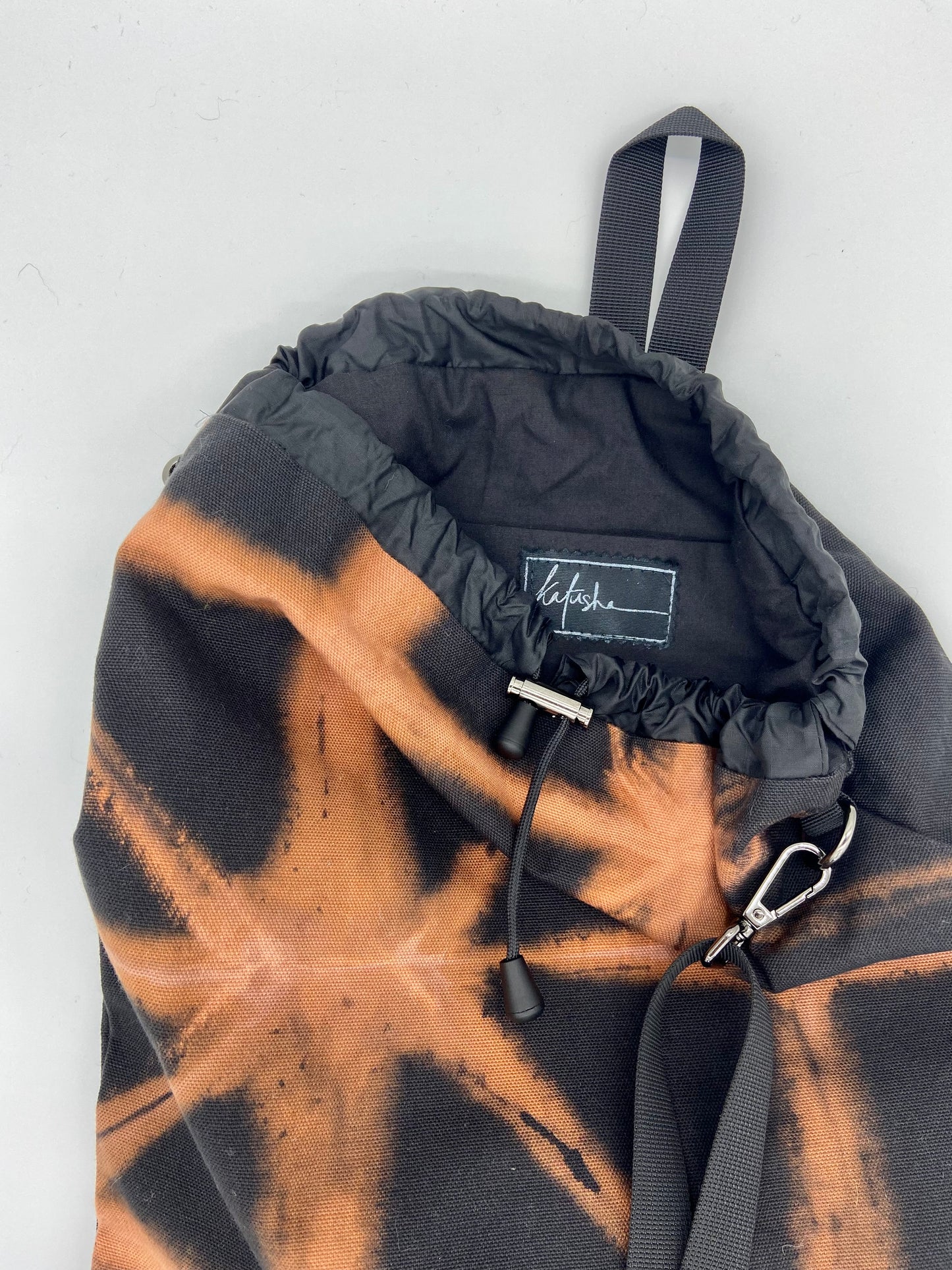 black drawstring backpack