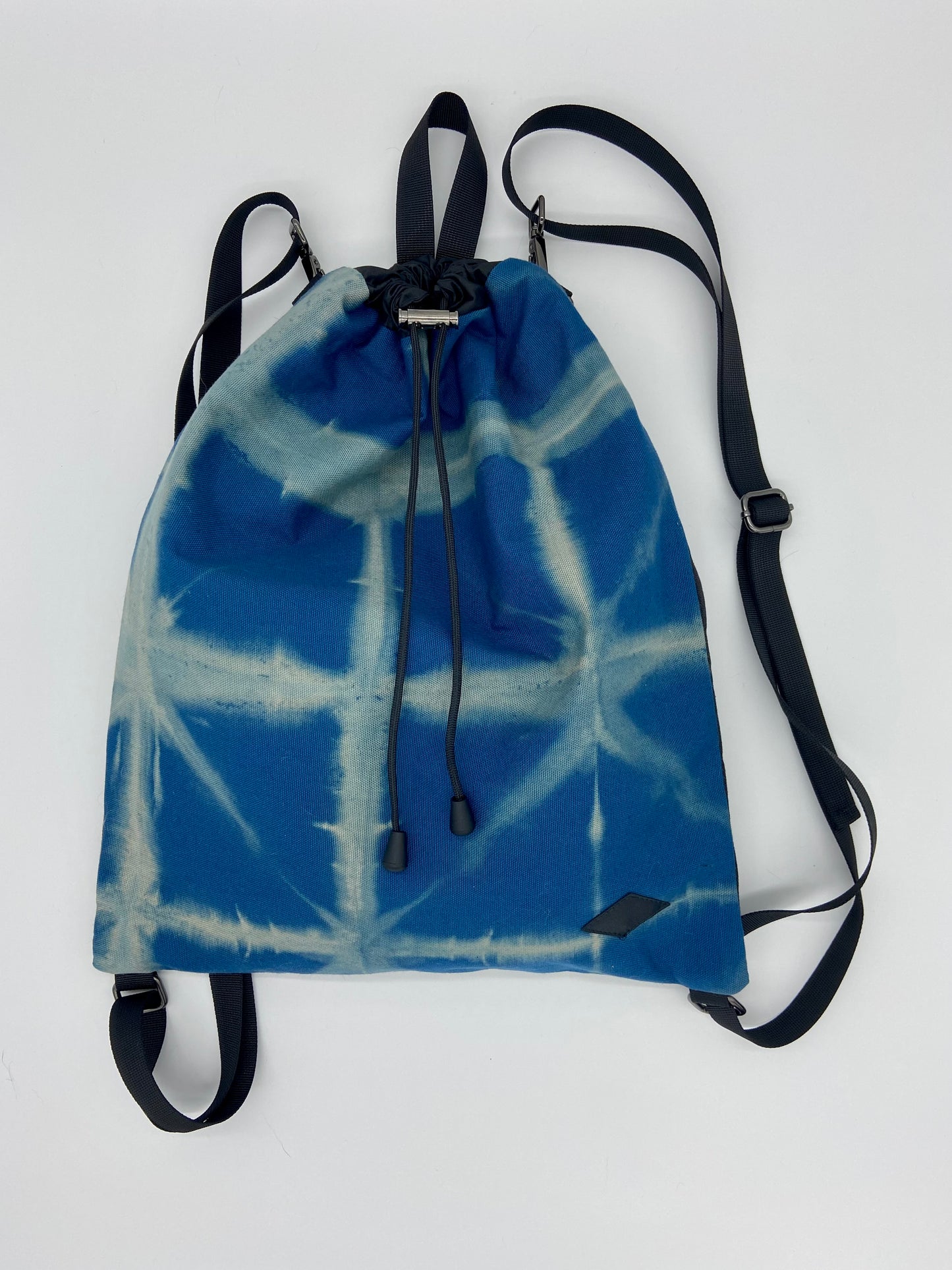 blue drawstring backpack