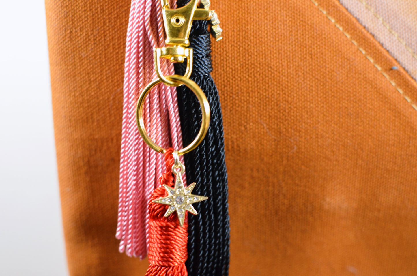tassel keychain with gold charm