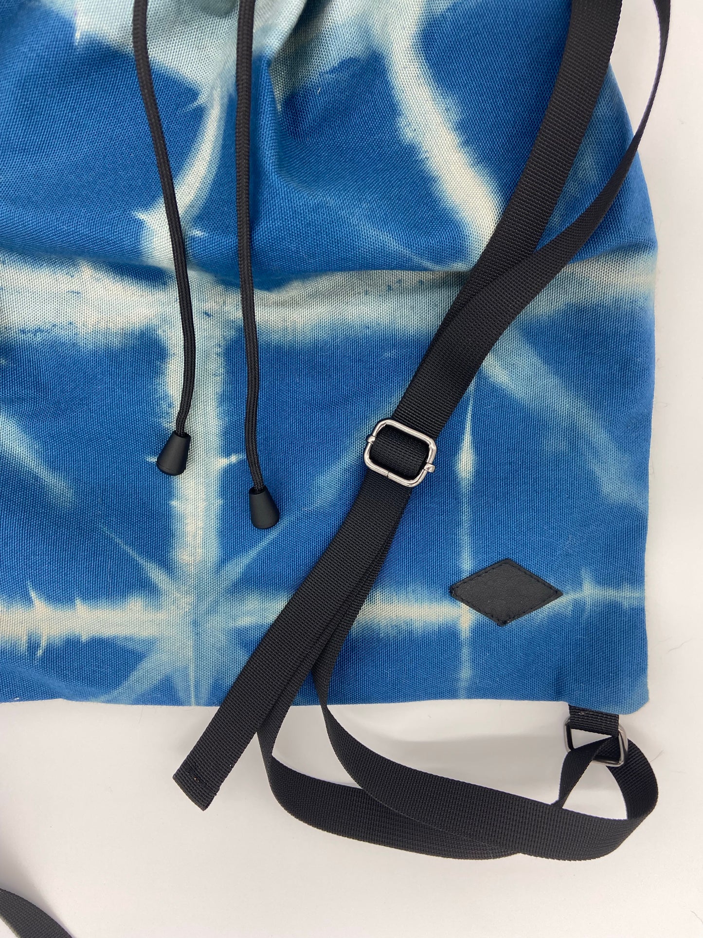 blue drawstring backpack