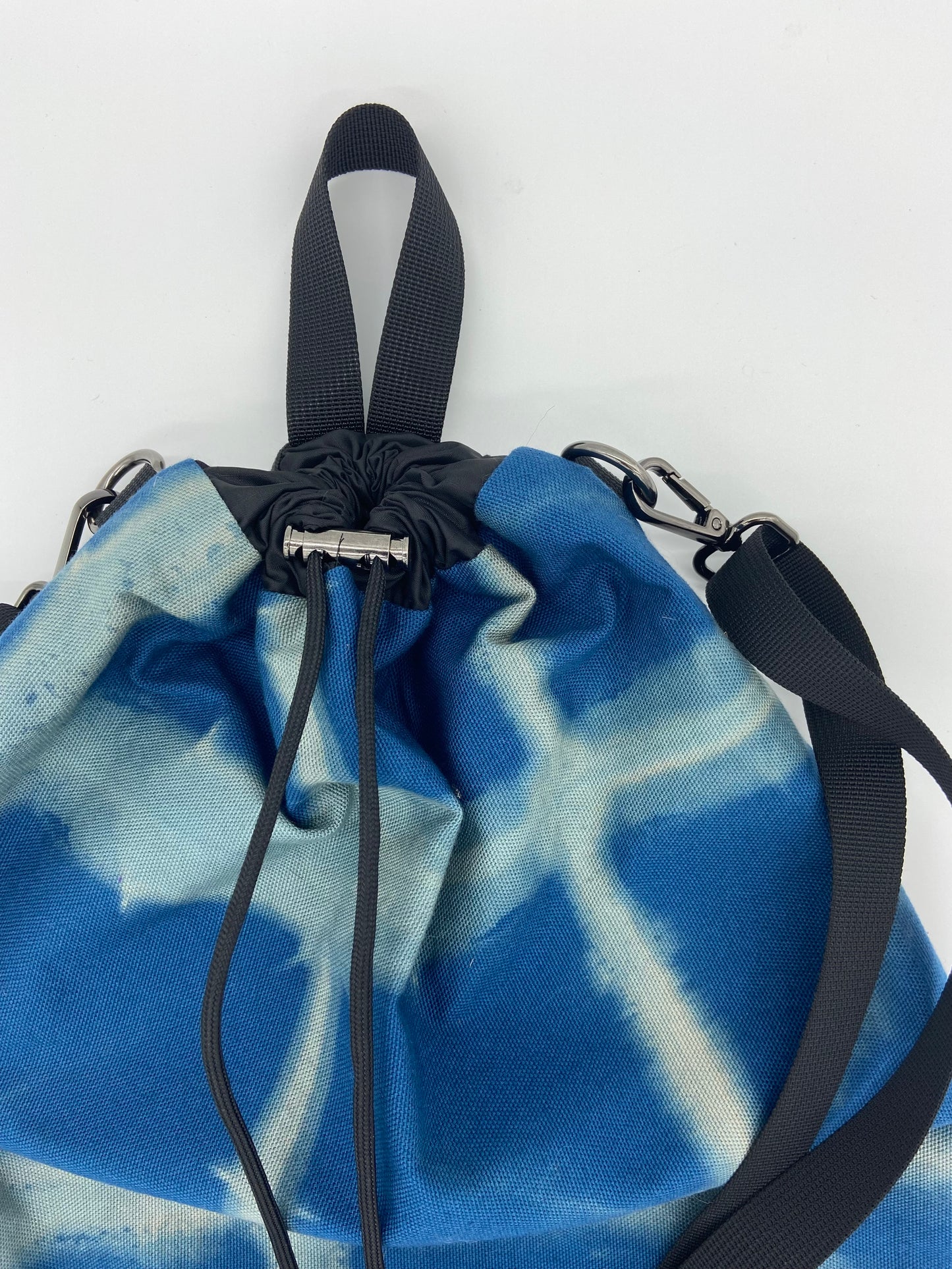 blue drawstring backpack